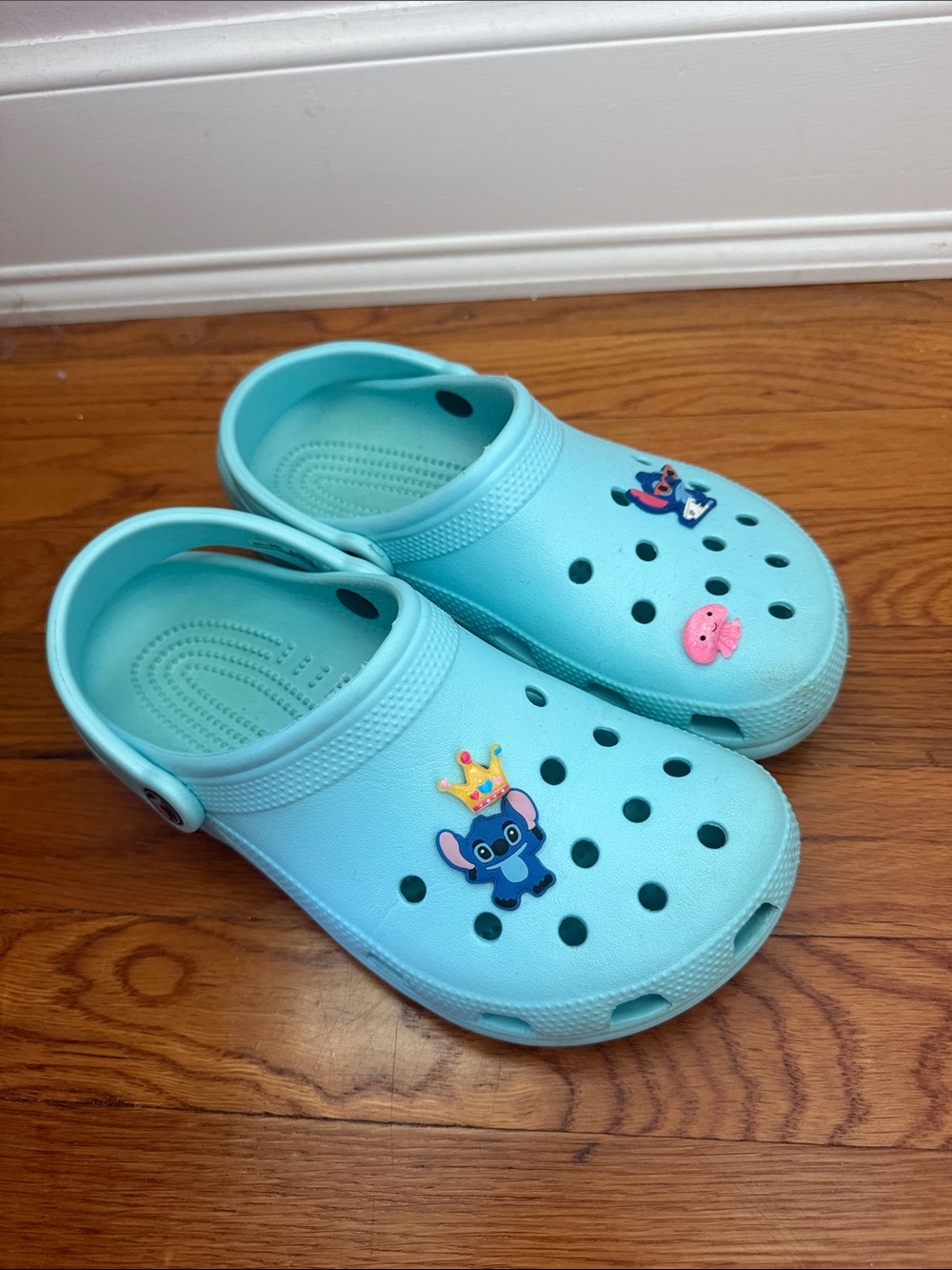 Teal Crocs with Stitch Charms